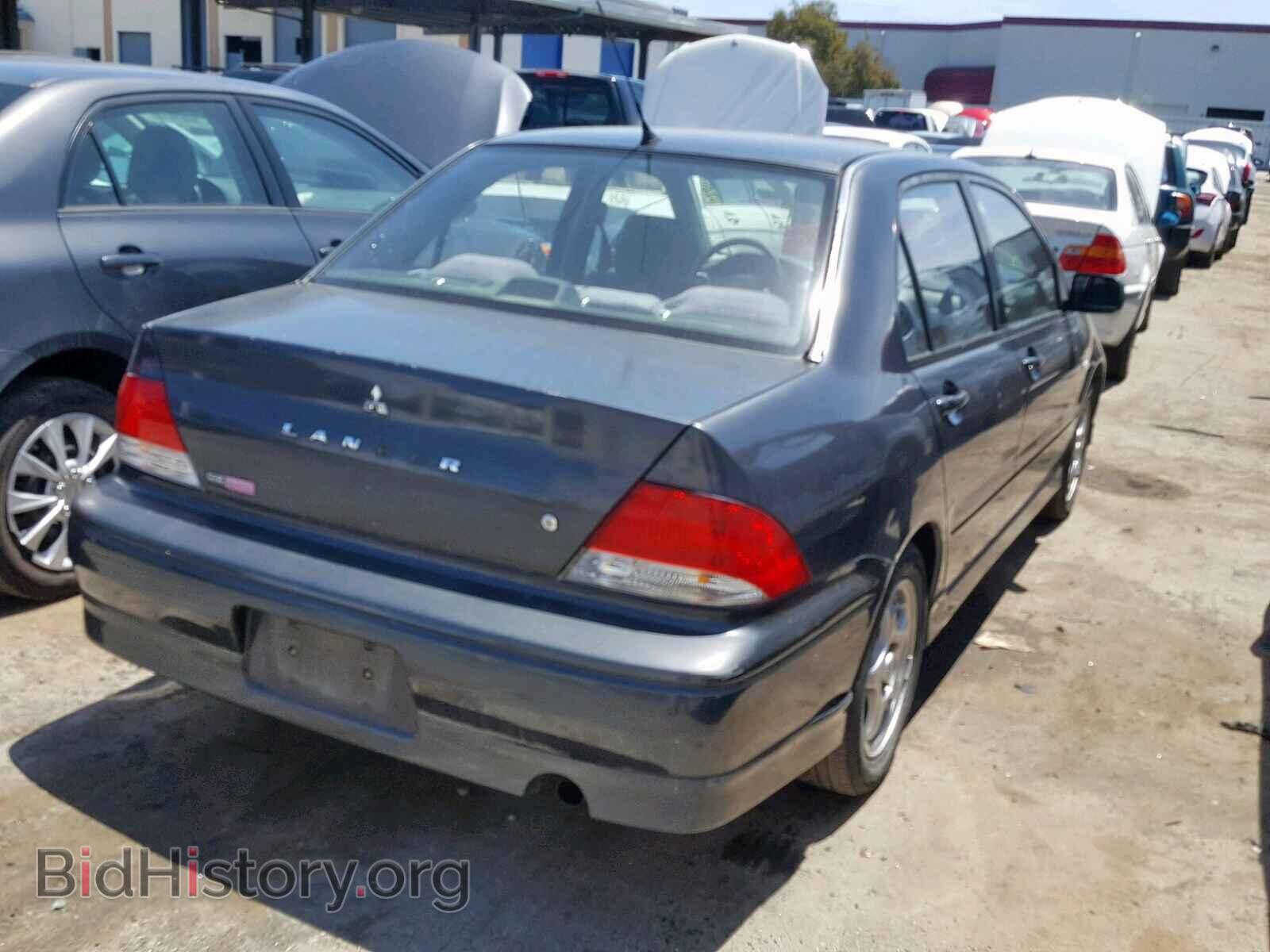 2002 MITSUBISHI LANCER - VIN: JA3AJ86E42U012116 - Photo 4