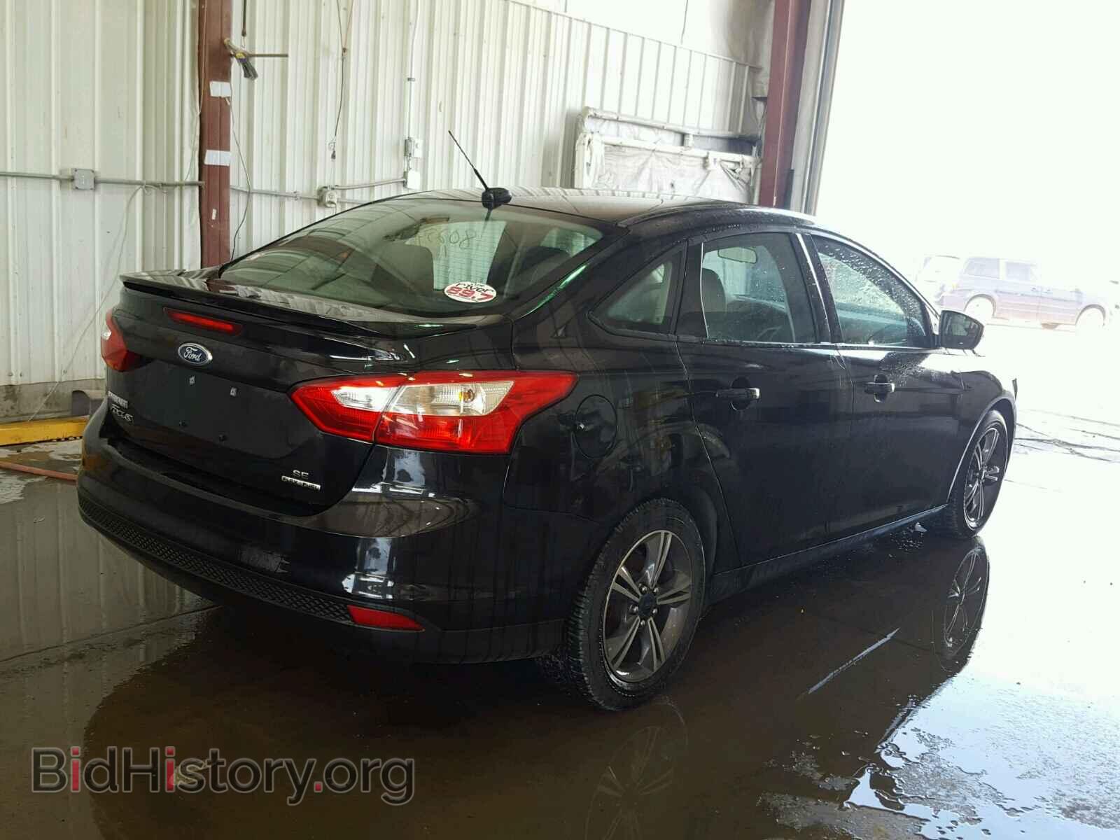 2014 FORD FOCUS - VIN: 1FADP3F2XEL197388 - Photo 4