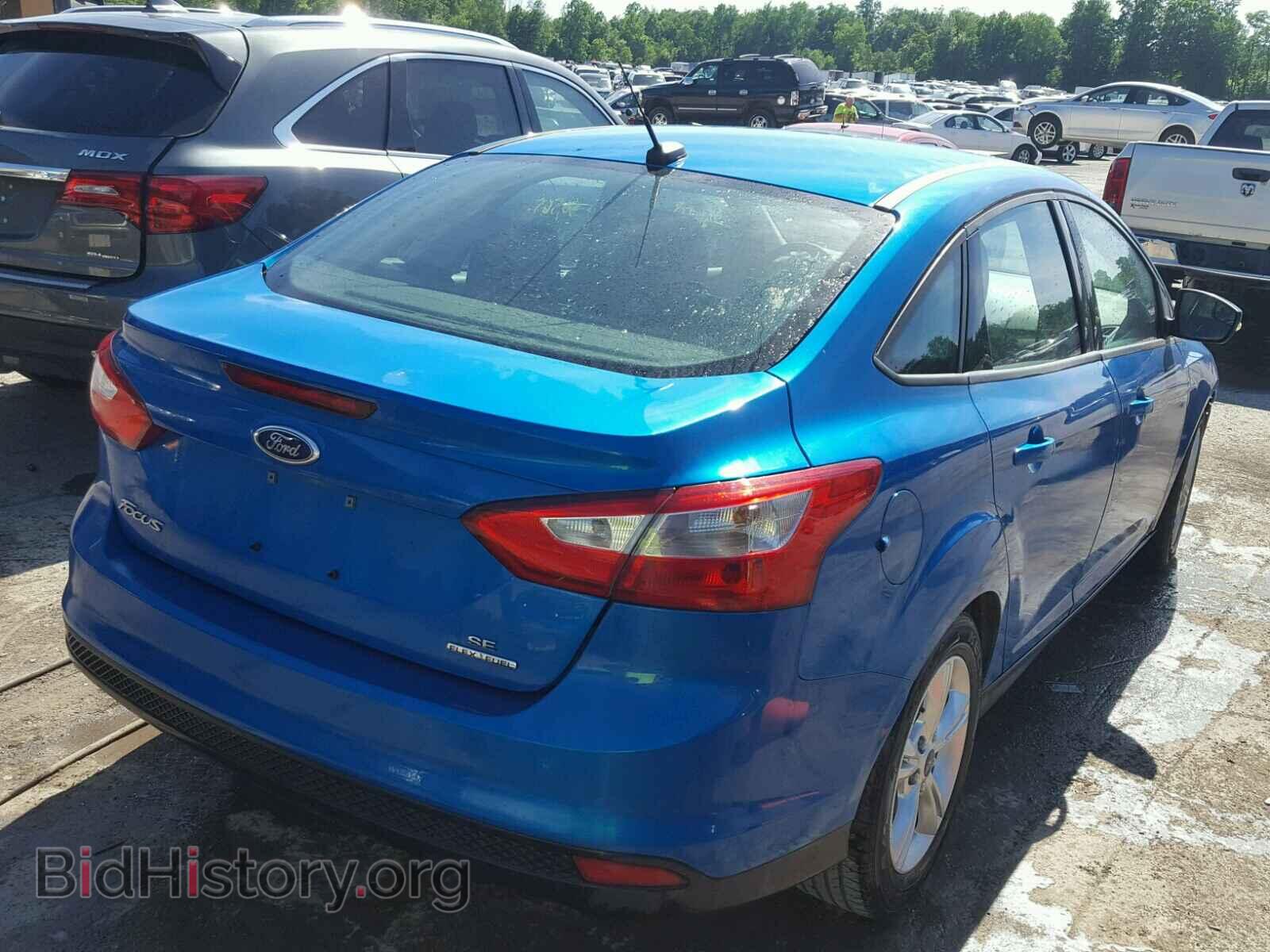 2014 FORD FOCUS - VIN: 1FADP3F25EL128933 - Photo 4