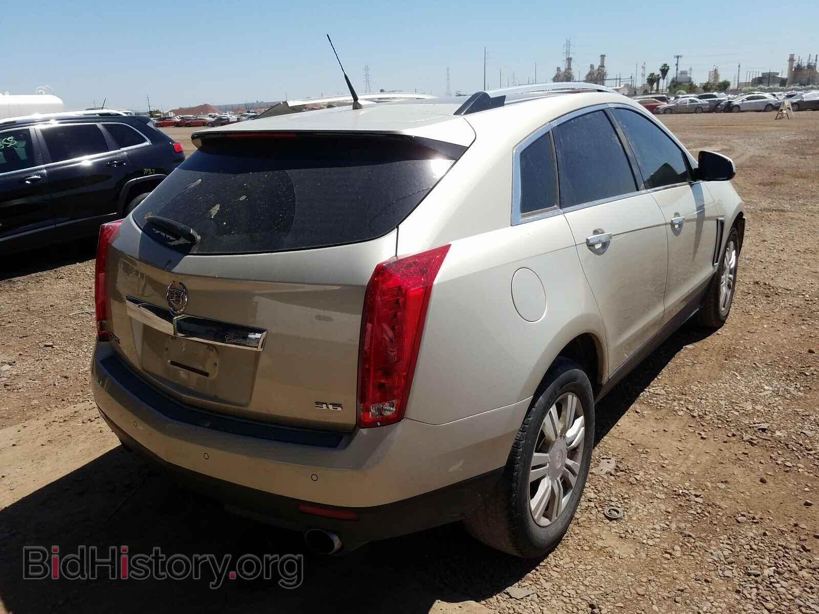 2013 CADILLAC SRX - VIN: 3GYFNCE37DS580744 - Фото 4