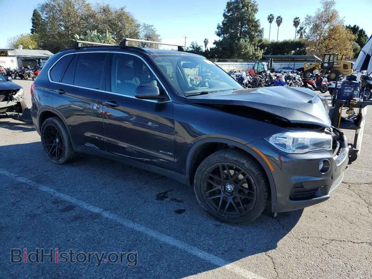 2014 BMW X5 - VIN: 5UXKR2C51E0H34348 - Фото 4
