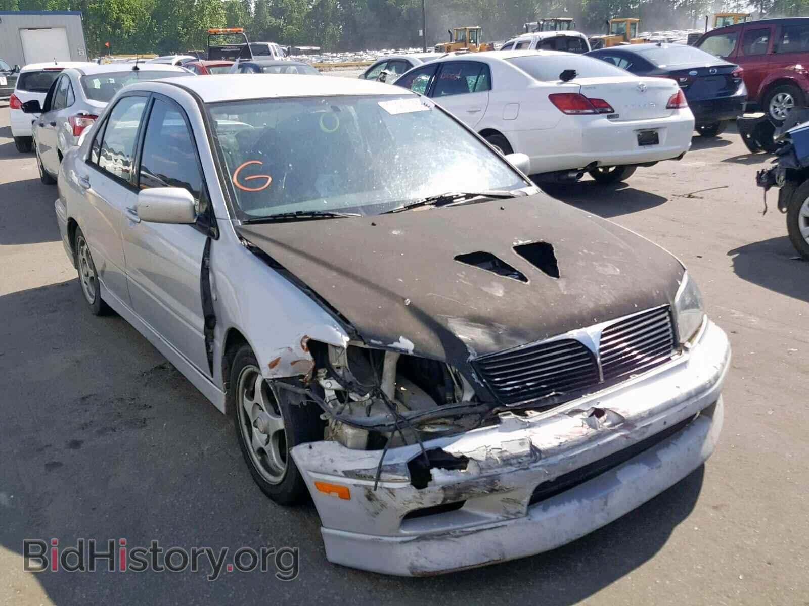 Фотография JA3AJ86E82U084324 - MITSUBISHI LANCER 2002