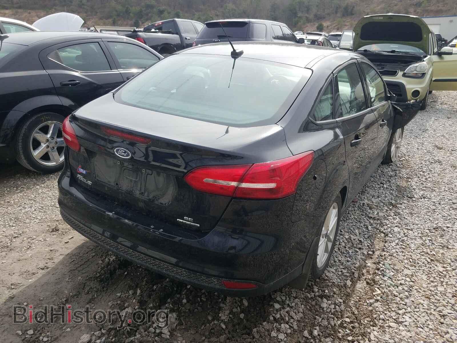 2016 FORD FOCUS - VIN: 1FADP3F21GL332180 - Photo 4