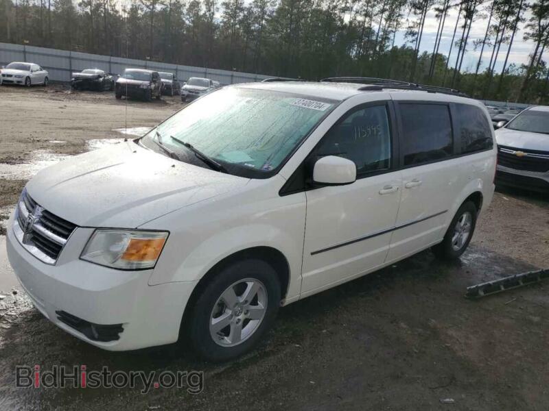 2010 Dodge CARAVAN SXT (VIN 2D4RN5D18AR251299) — фото 1 из 14, Copart, повреждение: бок