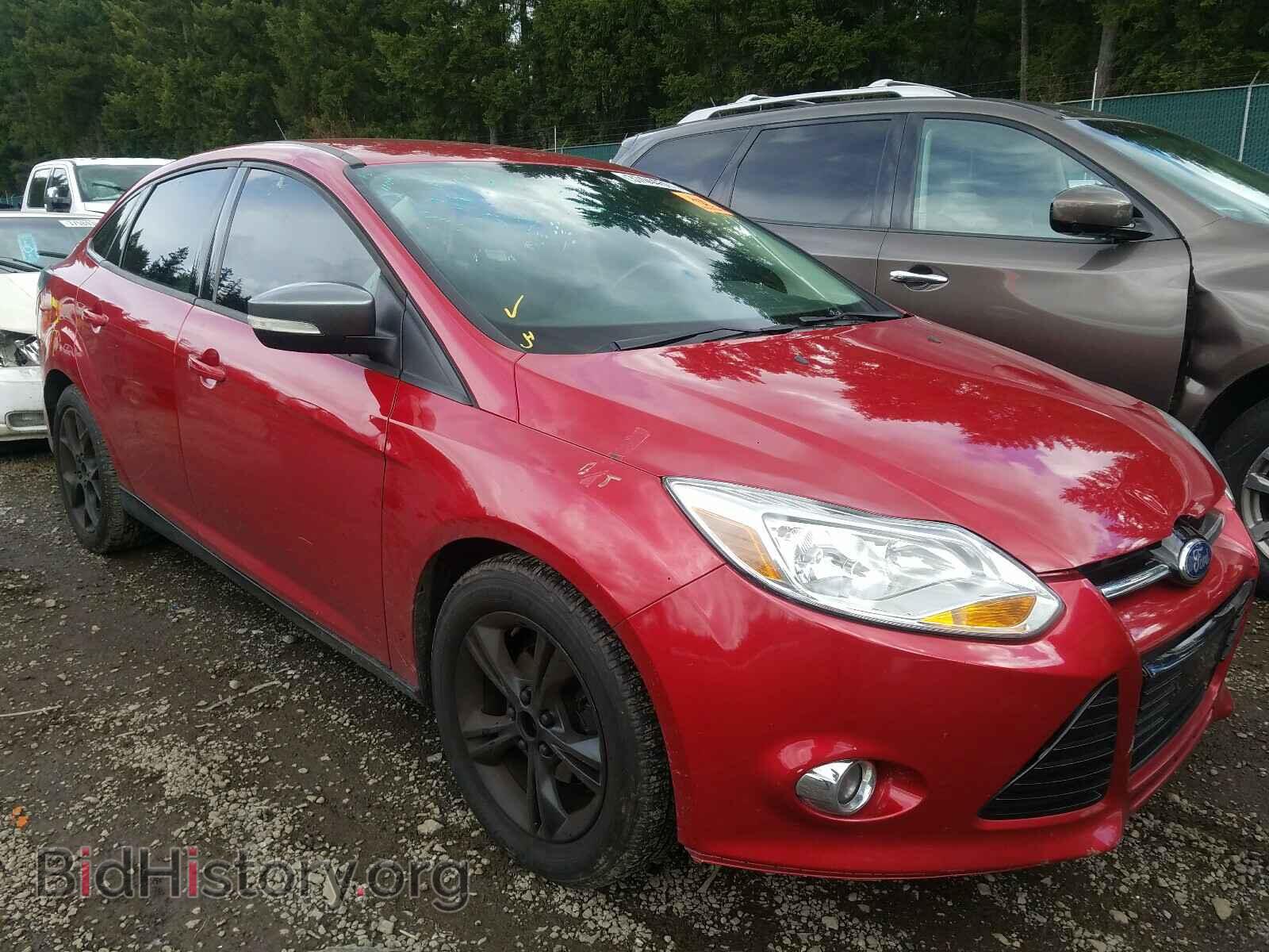 Фотография 1FAHP3F27CL302581 - FORD FOCUS 2012