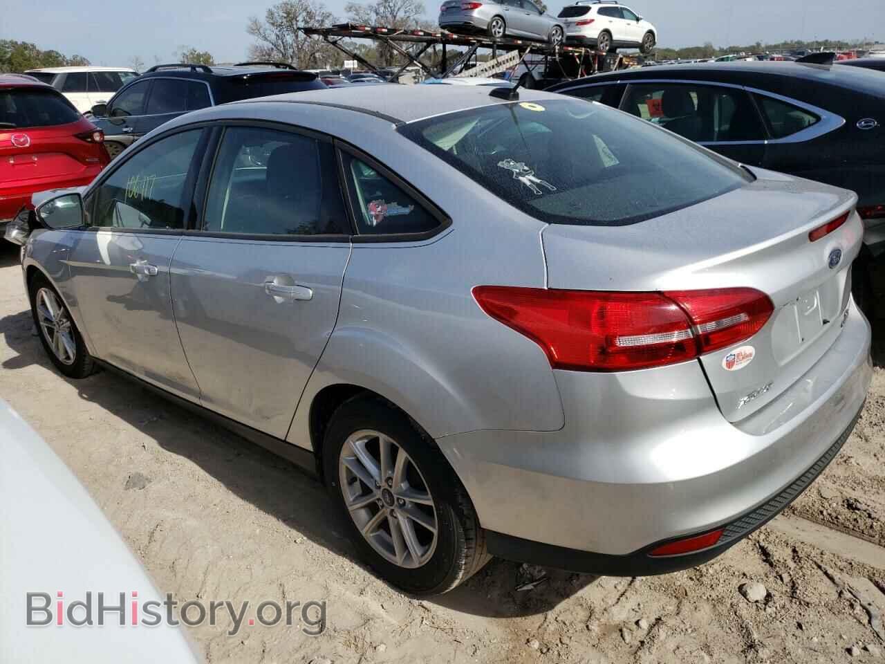 2016 FORD FOCUS - VIN: 1FADP3F29GL328104 - Фото 2