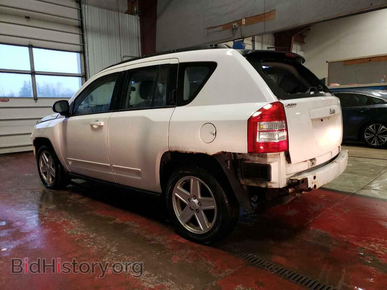2010 JEEP COMPASS - VIN: 1J4NT4FB2AD554125 - Photo 2