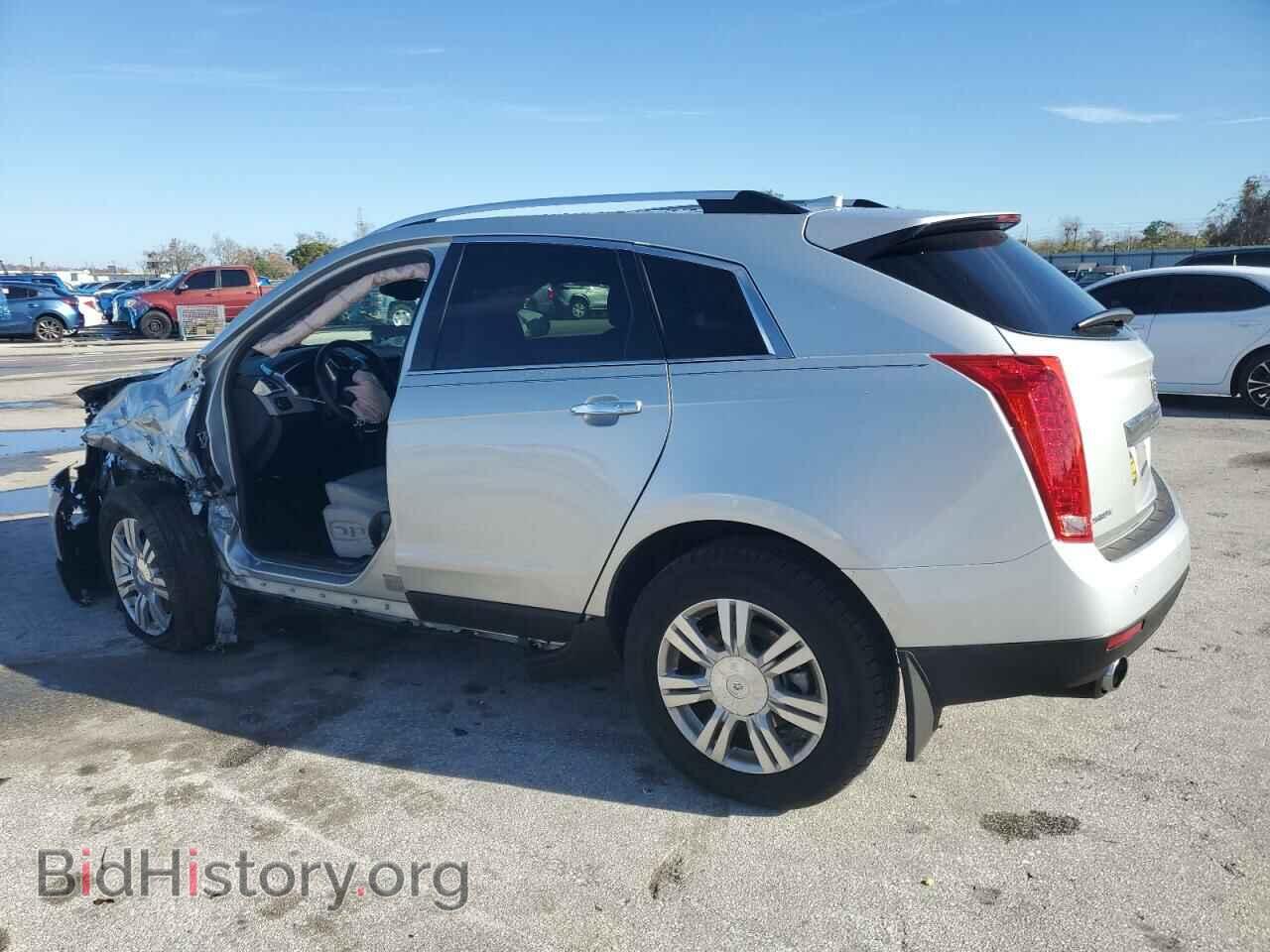 2013 CADILLAC SRX - VIN: 3GYFNCE39DS570149 - Фото 2