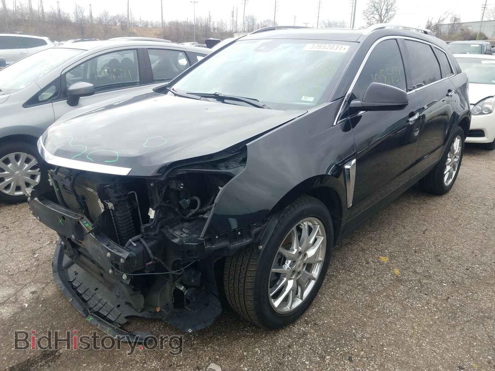2014 CADILLAC SRX - VIN: 3GYFNDE35ES567806 - Фото 2