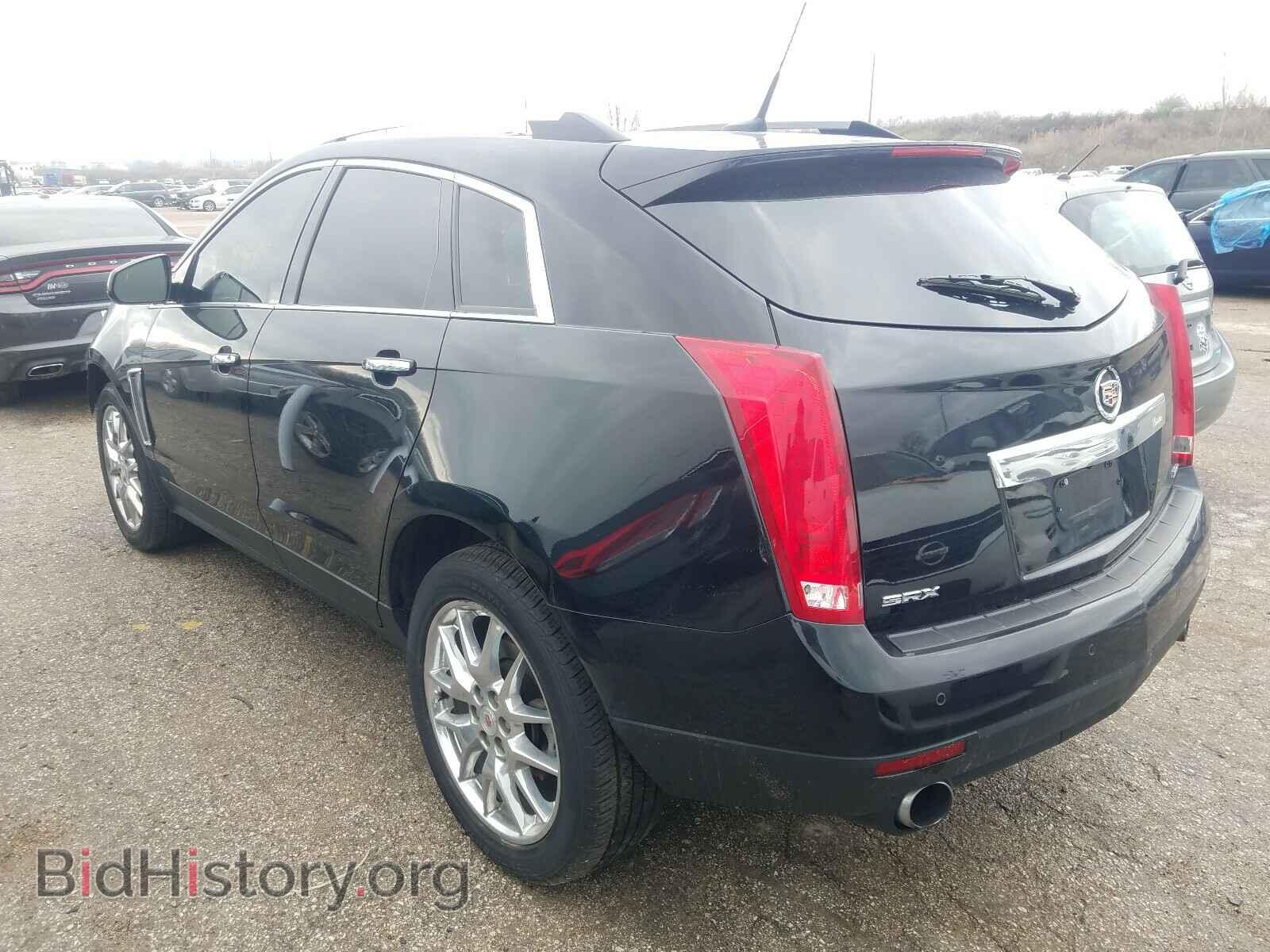 2014 CADILLAC SRX - VIN: 3GYFNDE35ES567806 - Фото 3