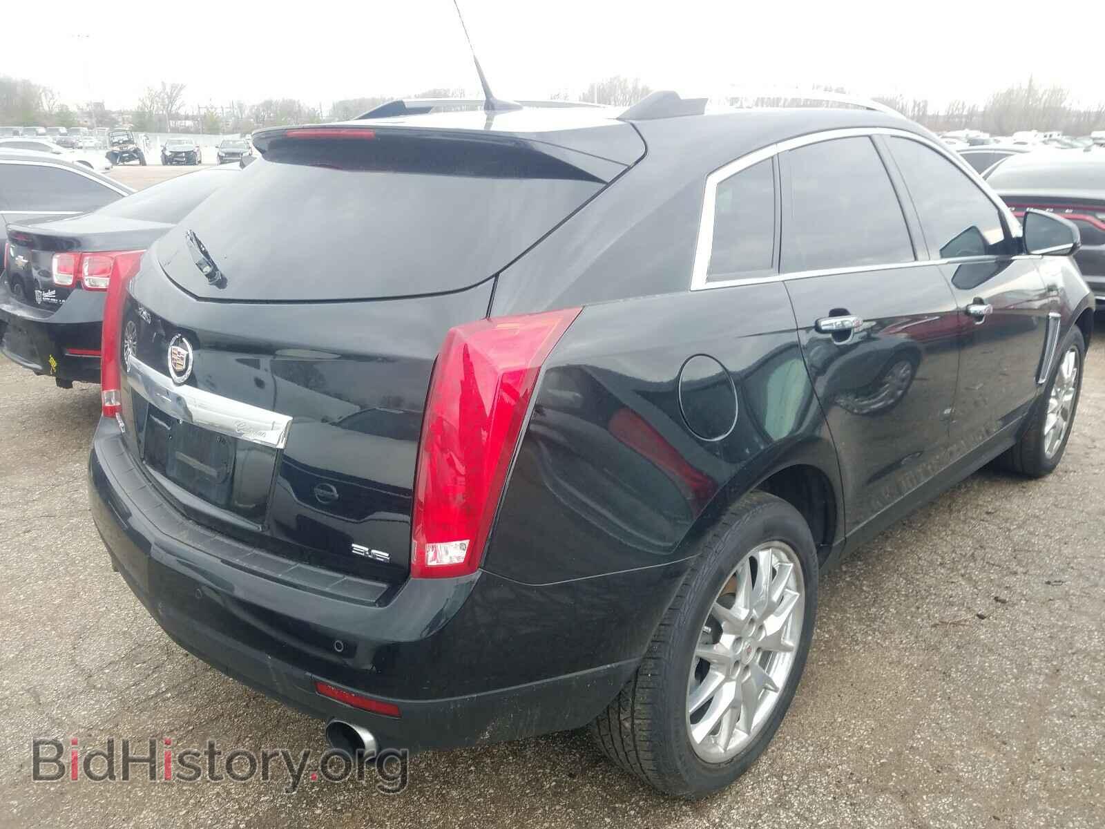 2014 CADILLAC SRX - VIN: 3GYFNDE35ES567806 - Фото 4