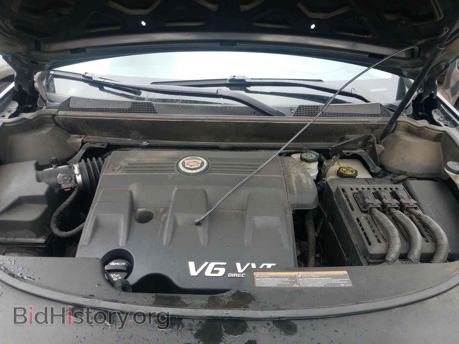 2014 CADILLAC SRX - VIN: 3GYFNDE35ES567806 - Фото 7