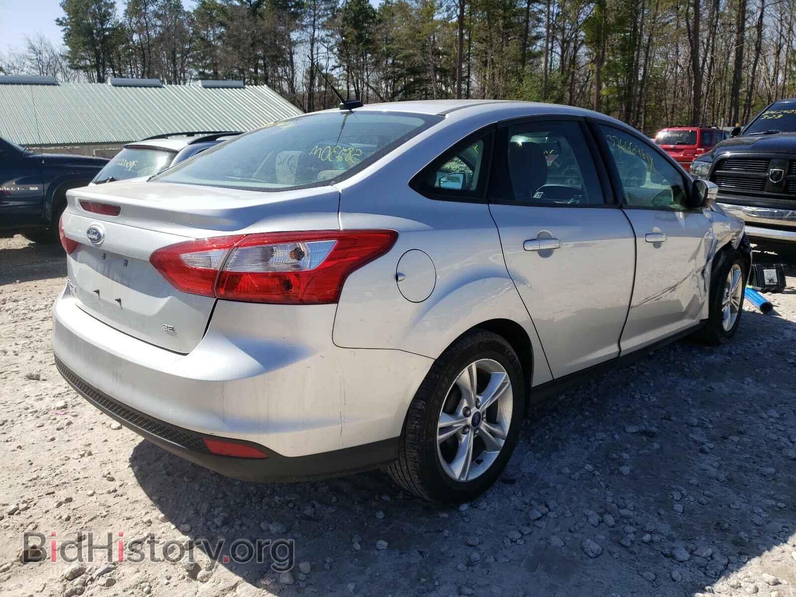 2014 FORD FOCUS - VIN: 1FADP3F2XEL318968 - Photo 4