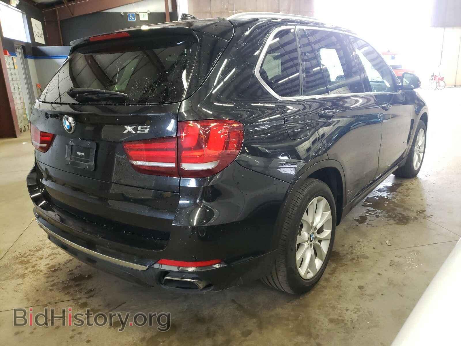 2014 BMW X5 - VIN: 5UXKR6C59E0C02935 - Фото 4