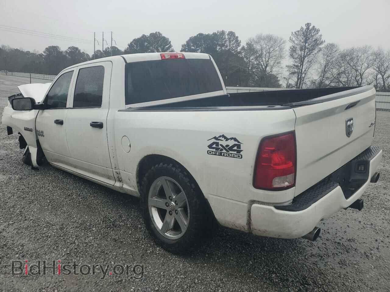 2014 RAM 1500 - VIN: 3C6RR7KT0EG334469 - Фото 2