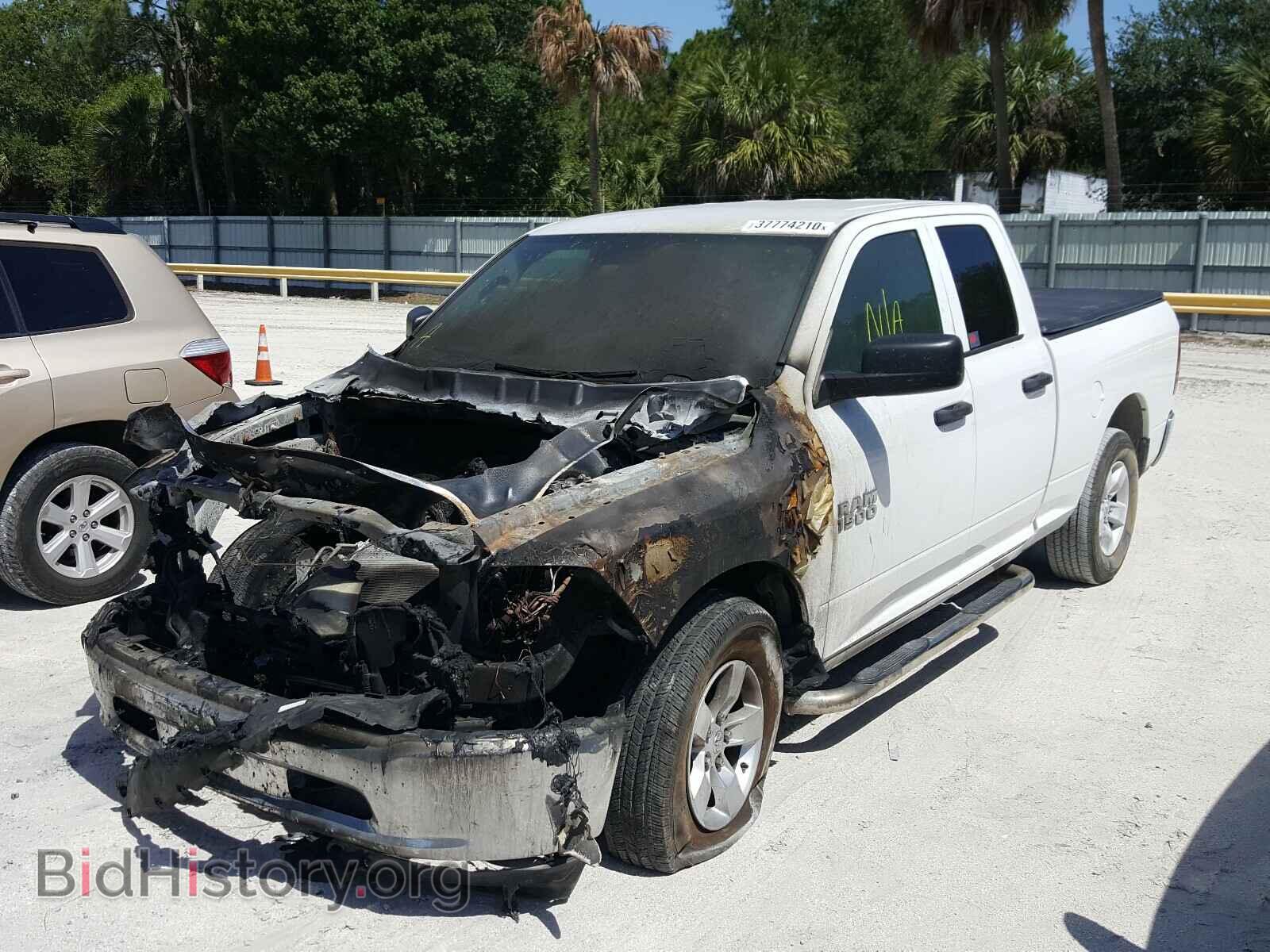 2014 RAM 1500 - VIN: 1C6RR6FG5ES319272 - Фото 2