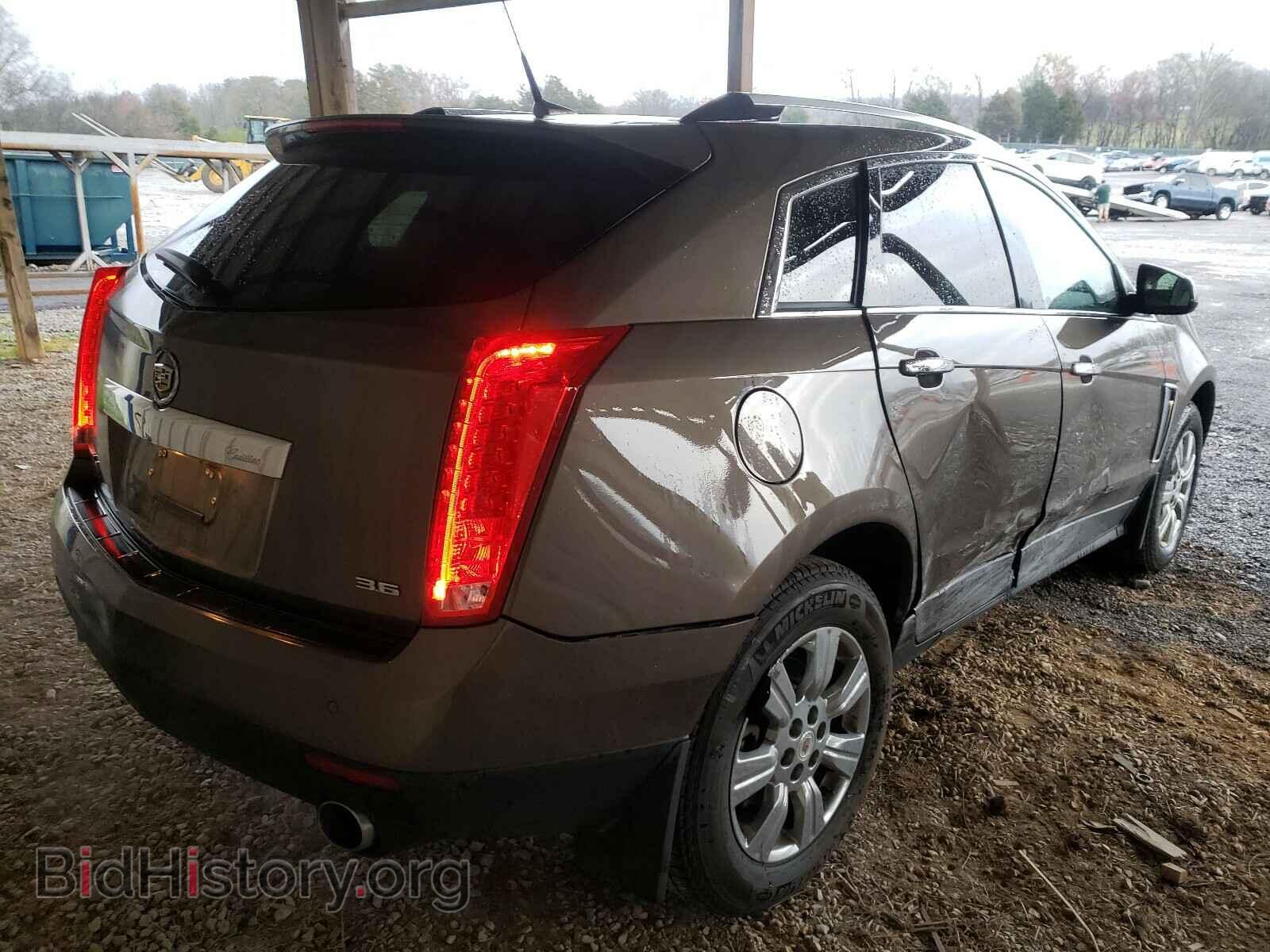 2014 CADILLAC SRX - VIN: 3GYFNEE36ES666950 - Фото 4