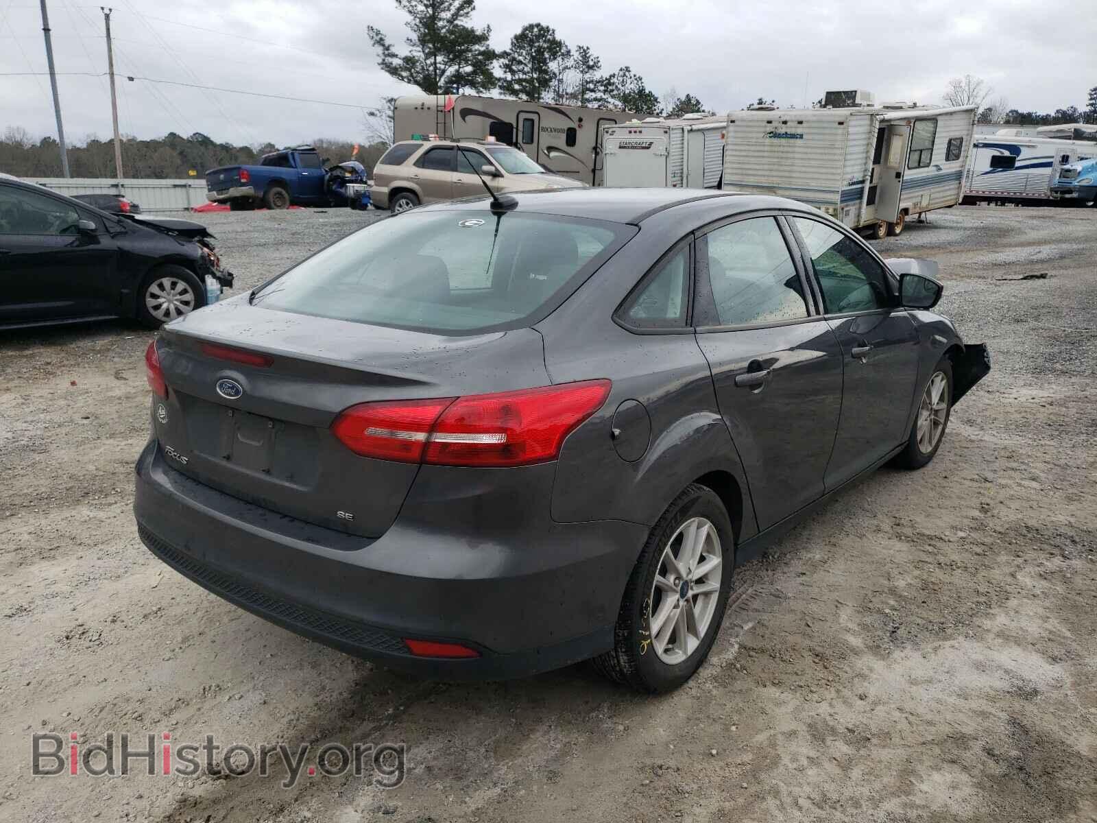 2017 FORD FOCUS - VIN: 1FADP3F21HL322461 - Photo 4