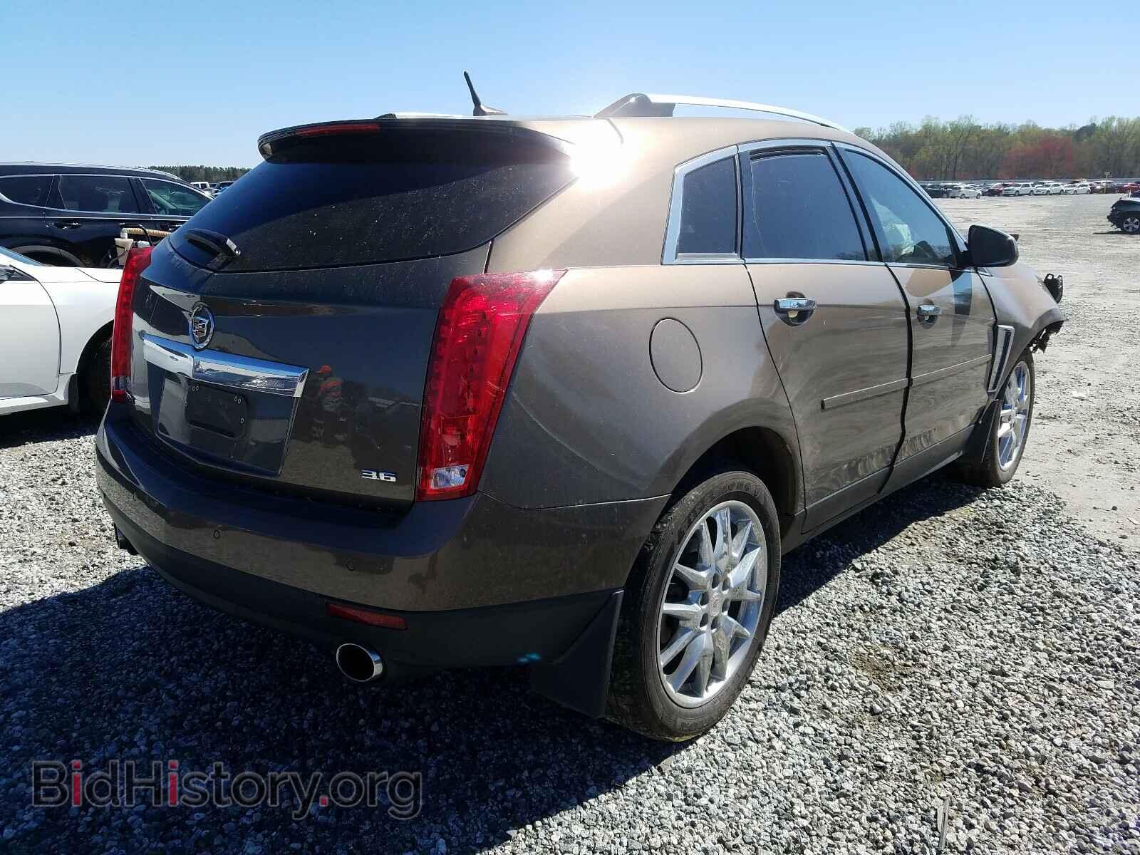 2014 CADILLAC SRX - VIN: 3GYFNDE38ES613337 - Фото 4