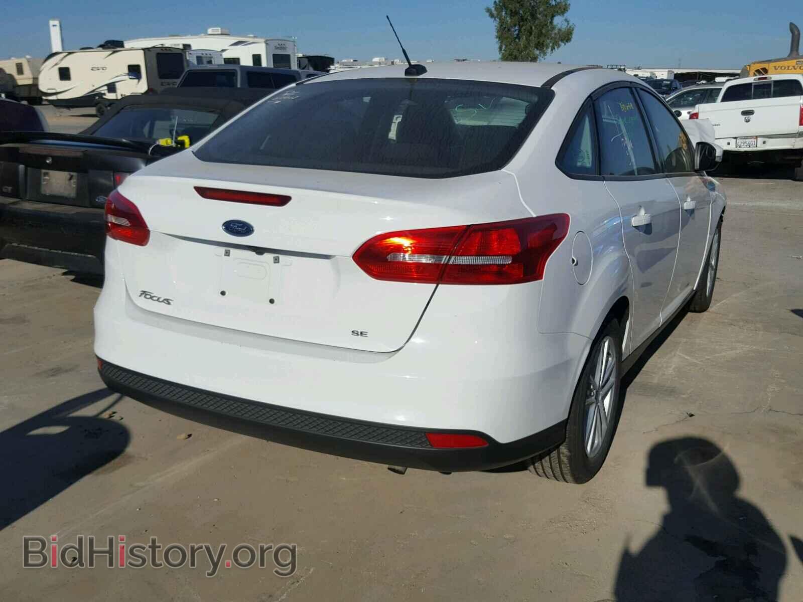 2017 FORD FOCUS - VIN: 1FADP3F20HL304369 - Photo 4