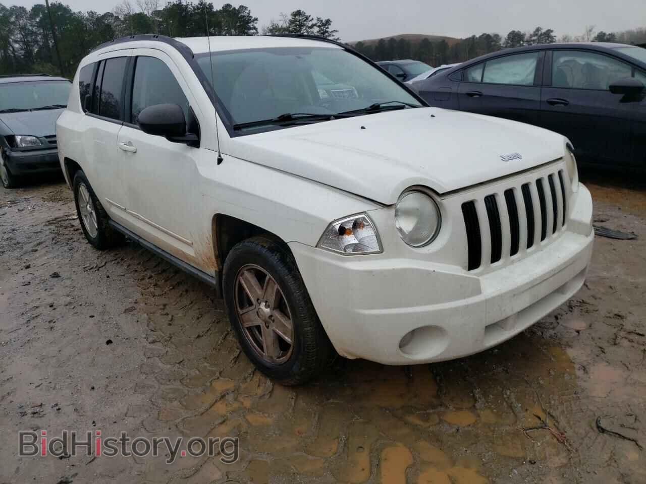 2010 JEEP COMPASS - VIN: 1J4NT4FB2AD578912 - Photo 9