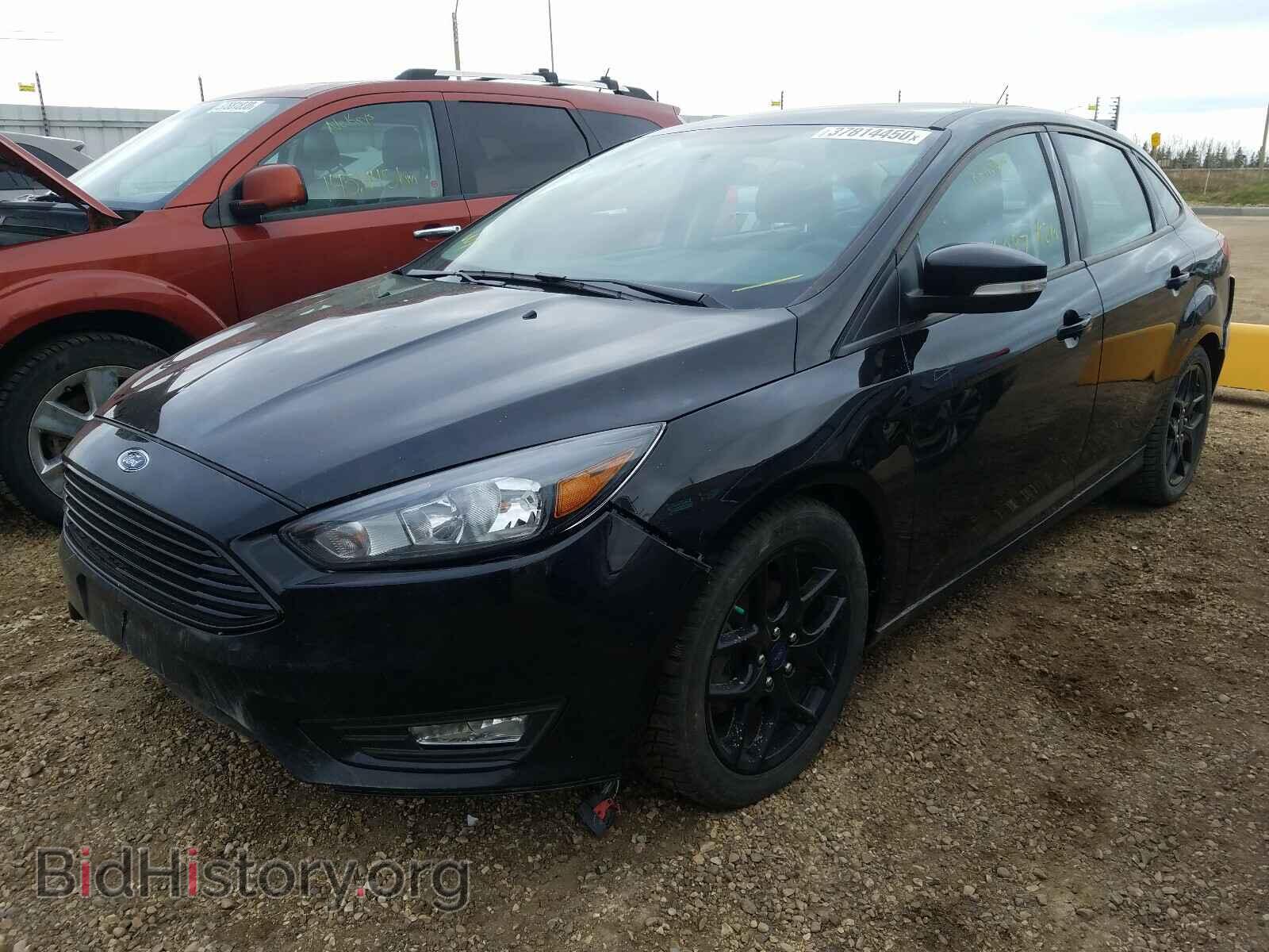 2016 FORD FOCUS - VIN: 1FADP3F24GL334084 - Photo 2
