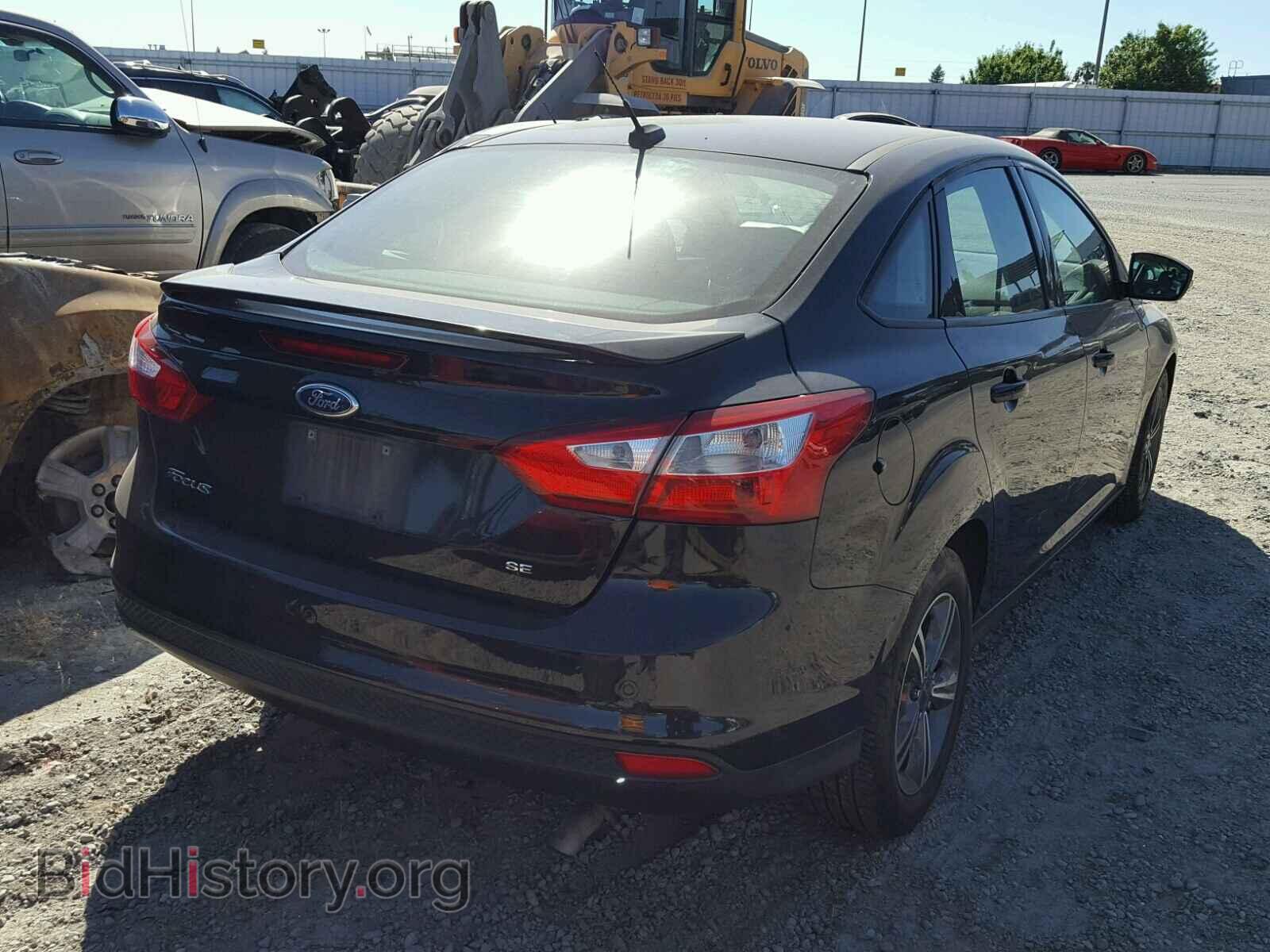 2014 FORD FOCUS - VIN: 1FADP3F21EL294821 - Photo 4