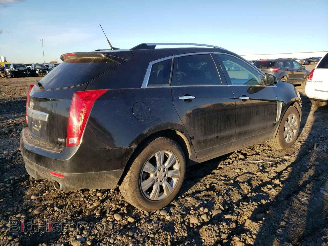 2014 CADILLAC SRX - VIN: 3GYFNEE32ES627188 - Фото 3