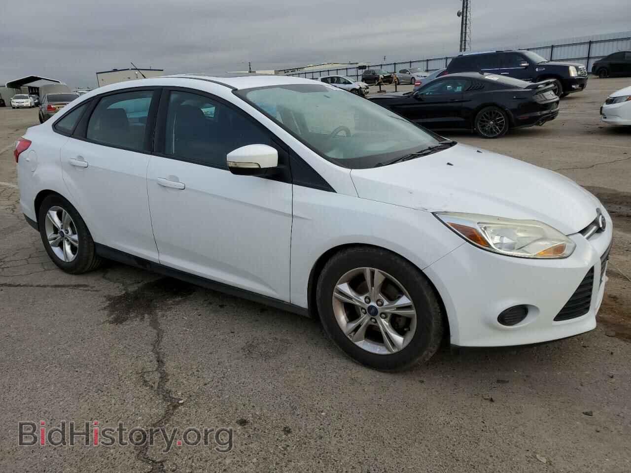 2014 FORD FOCUS - VIN: 1FADP3F20EL255783 - Photo 4