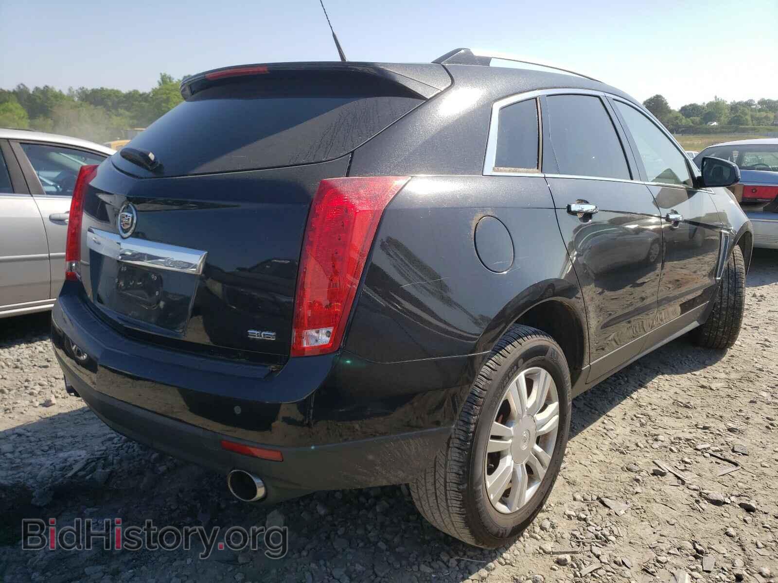 2013 CADILLAC SRX - VIN: 3GYFNCE38DS505499 - Фото 4