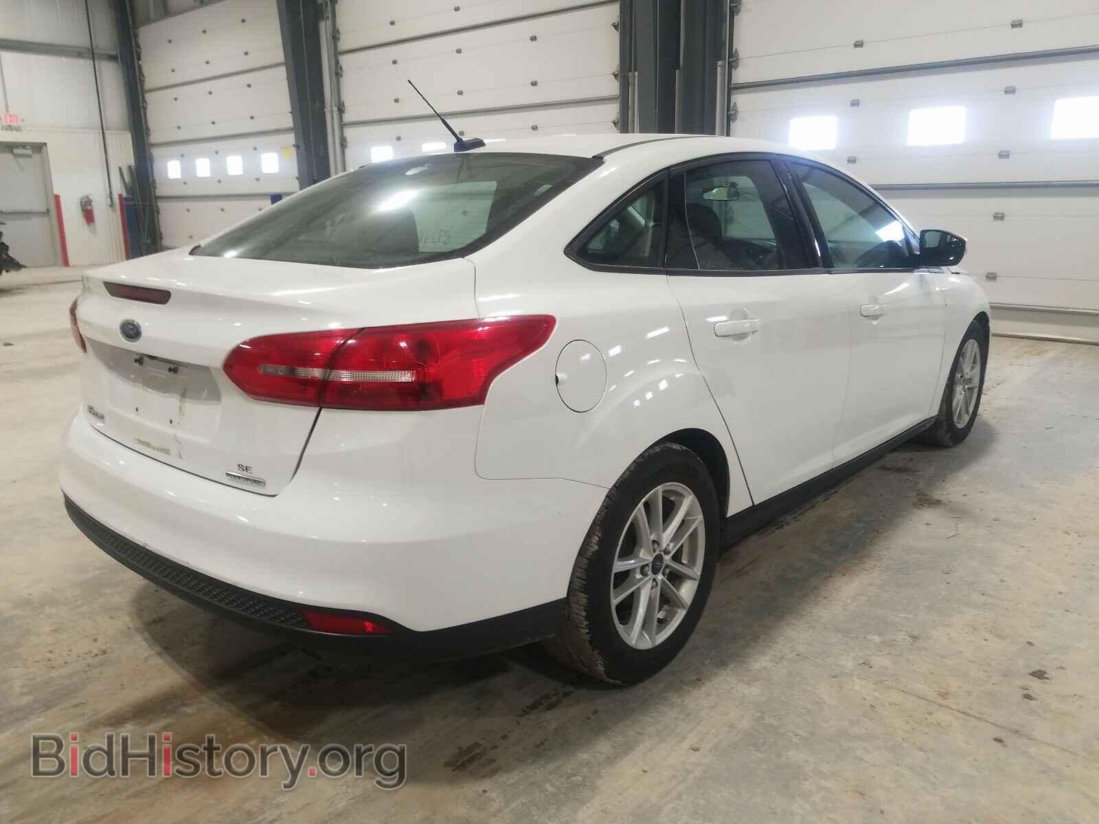 2015 FORD FOCUS - VIN: 1FADP3F29FL375986 - Photo 4