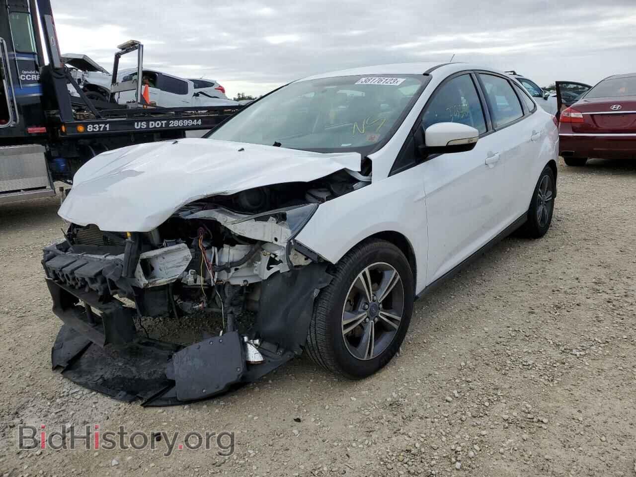 Фотография 1FADP3F24EL439608 - FORD FOCUS 2014