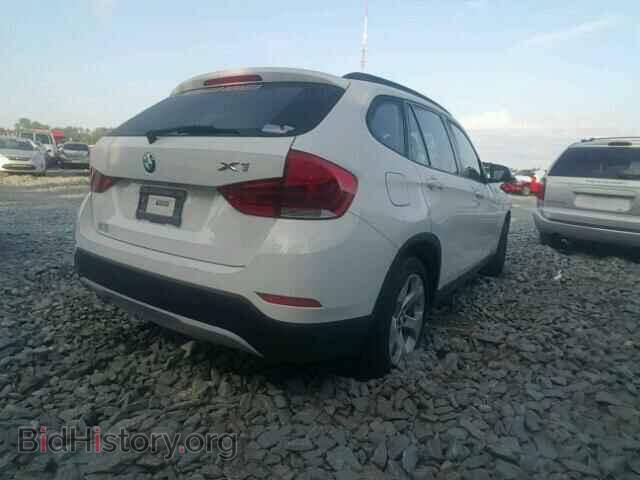 2014 BMW X1 - VIN: WBAVM1C5XEVW48007 - Фото 4