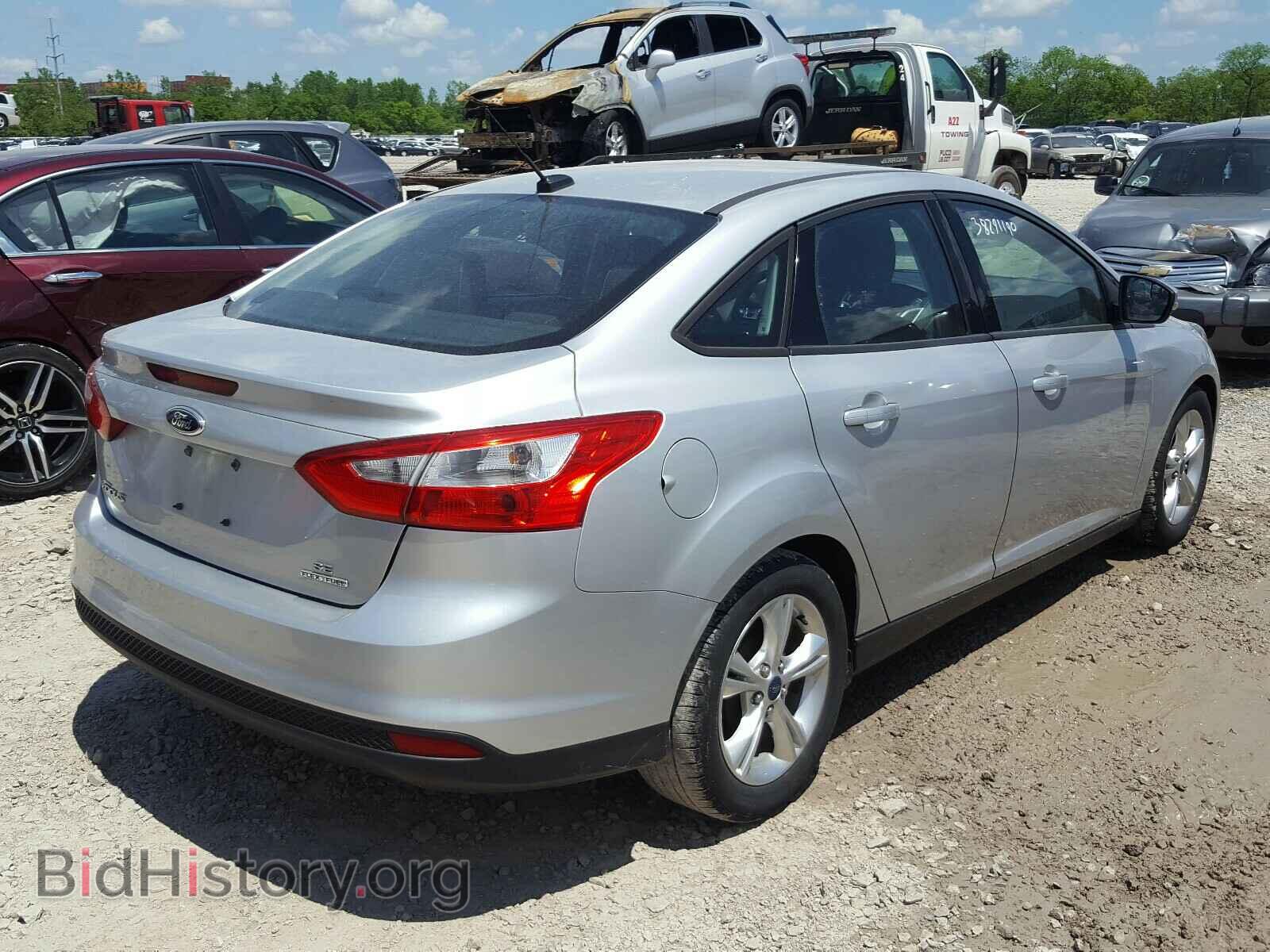 2014 FORD FOCUS - VIN: 1FADP3F23EL318049 - Photo 4