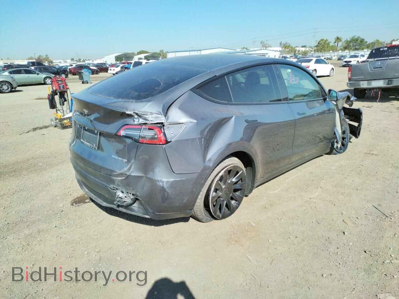 2022 TESLA MODEL Y - VIN: 7SAYGAEEXNF350398 - Фото 4