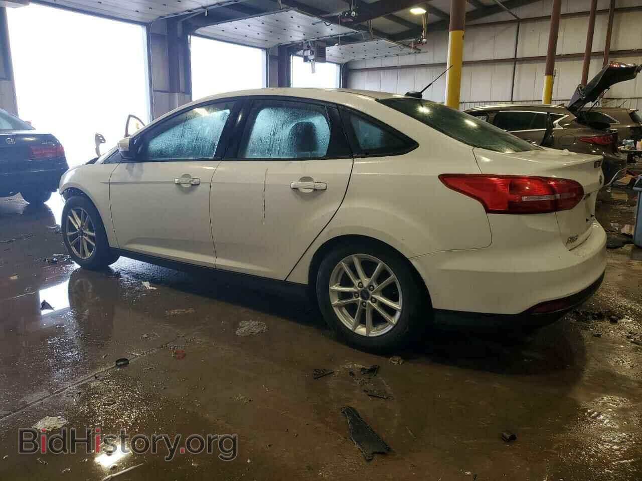 2016 FORD FOCUS - VIN: 1FADP3F21GL303035 - Фото 2