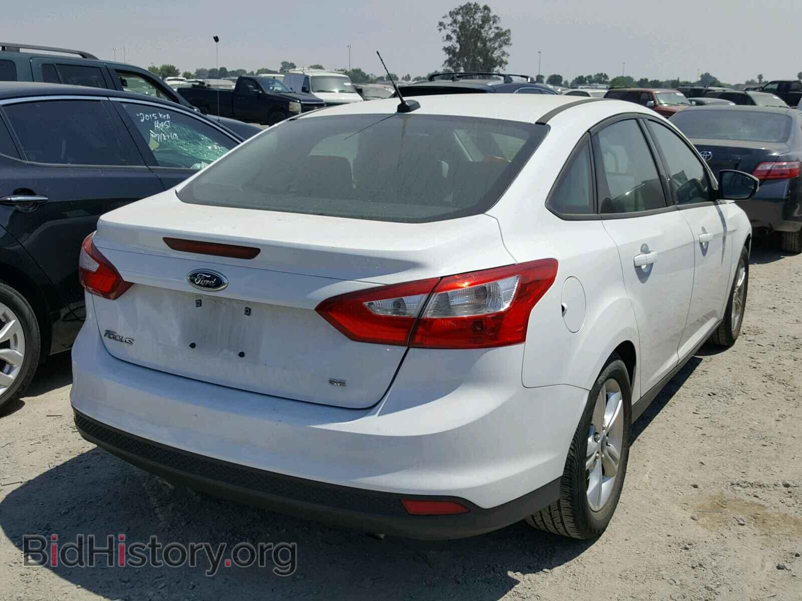 2014 FORD FOCUS - VIN: 1FADP3F21EL391677 - Photo 4