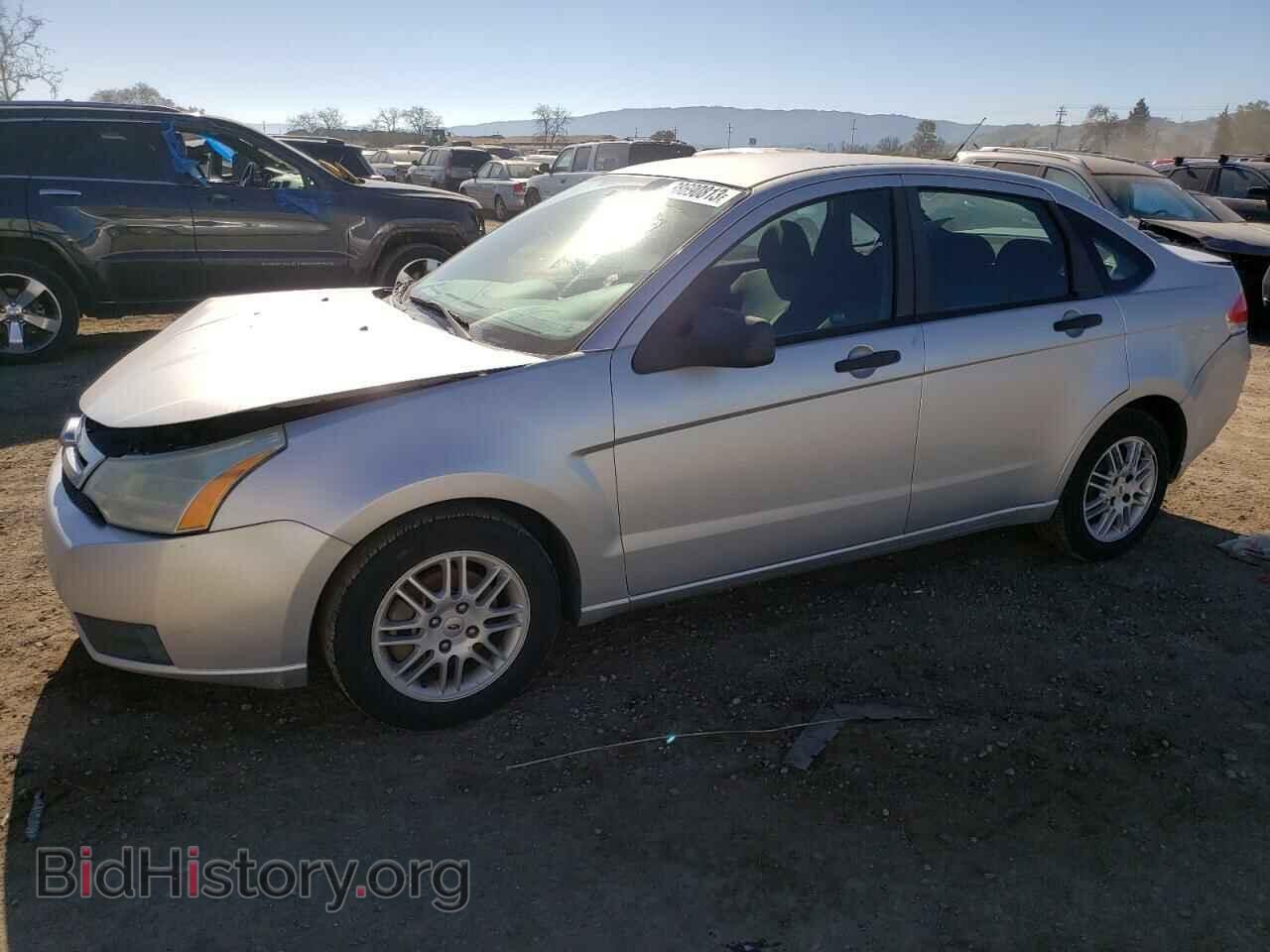 Photo 1FAHP3FN5AW218409 - FORD FOCUS 2010