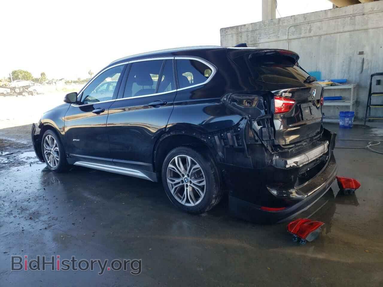2016 BMW X1 - VIN: WBXHT3Z32G4A50321 - Фото 2