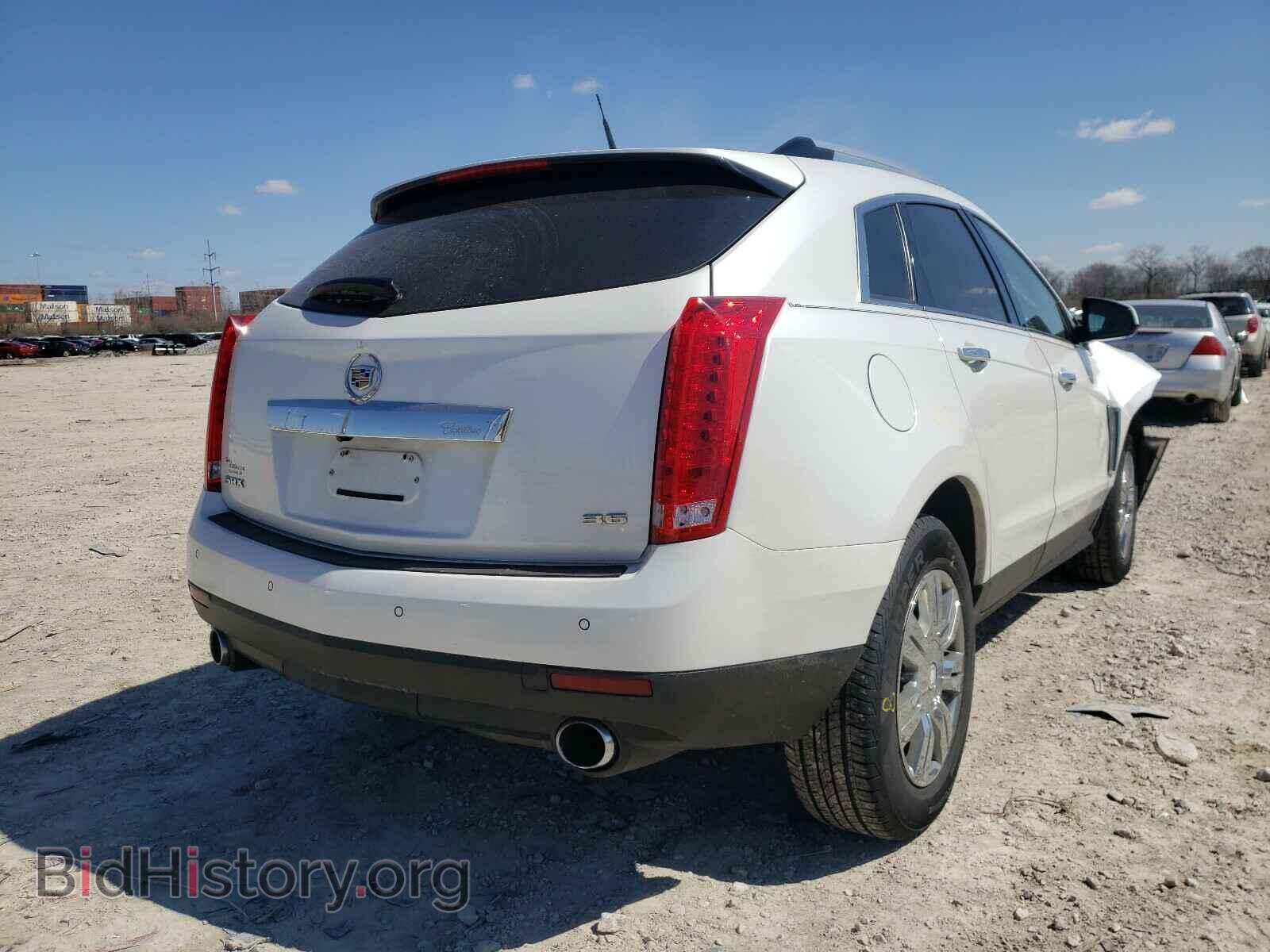 2013 CADILLAC SRX - VIN: 3GYFNCE37DS624371 - Фото 4