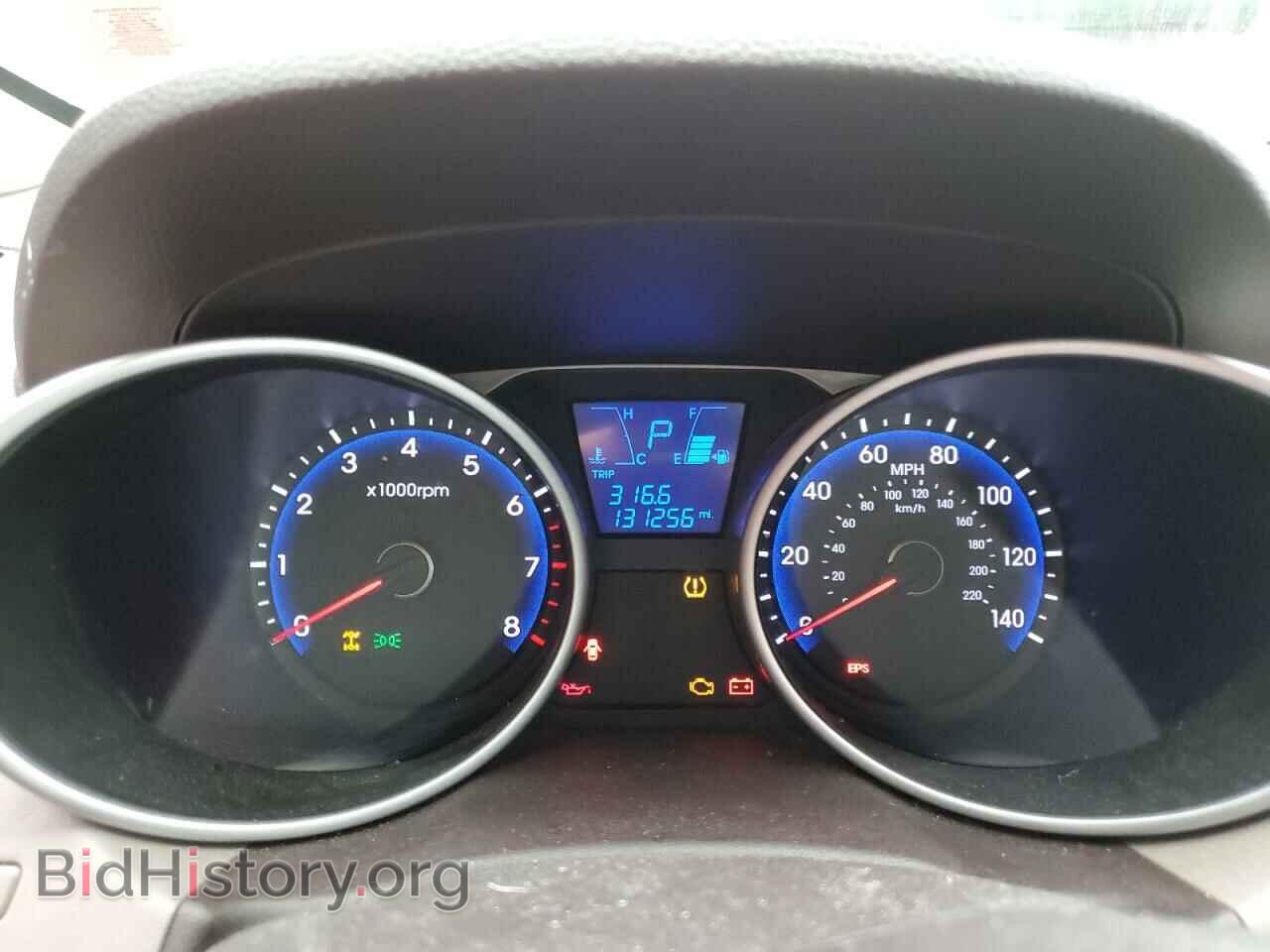 2012 HYUNDAI TUCSON - VIN: KM8JUCAC0CU541609 - Фото 9