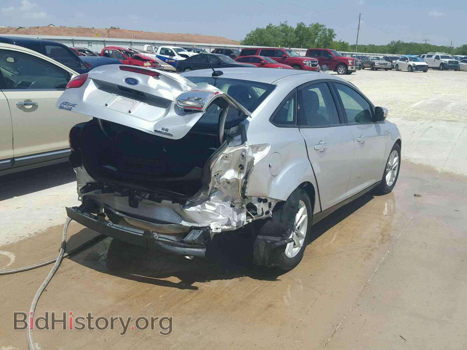 2015 FORD FOCUS - VIN: 1FADP3F2XFL210903 - Photo 4
