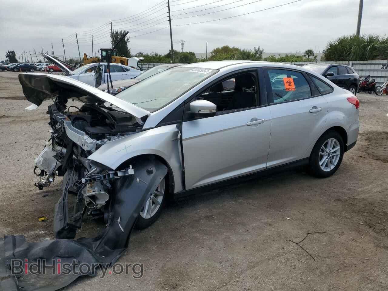 Фотография 1FADP3F2XHL307487 - FORD FOCUS 2017