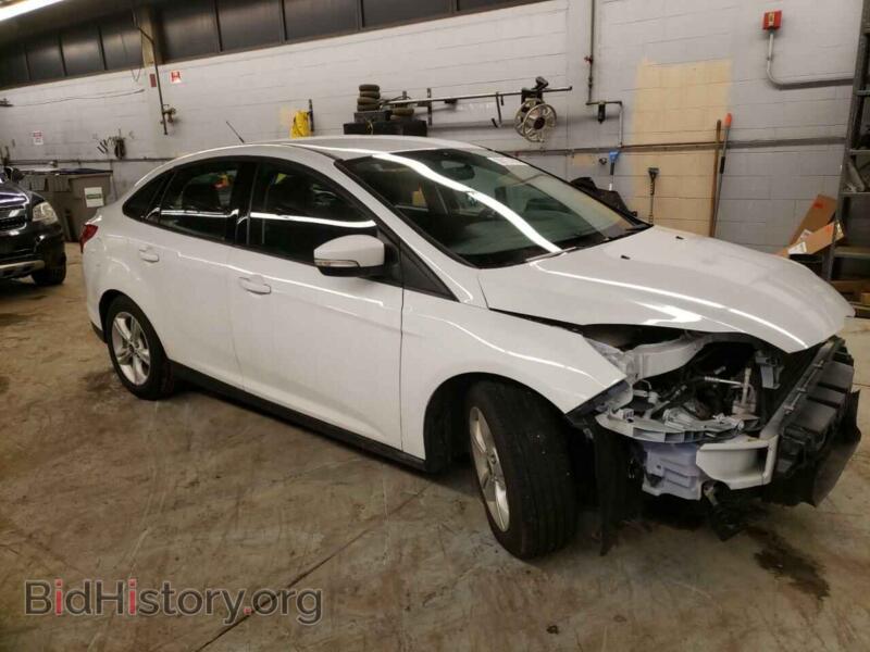 2014 Ford FOCUS (VIN 1FADP3F29EL404126) — фото 4 из 13