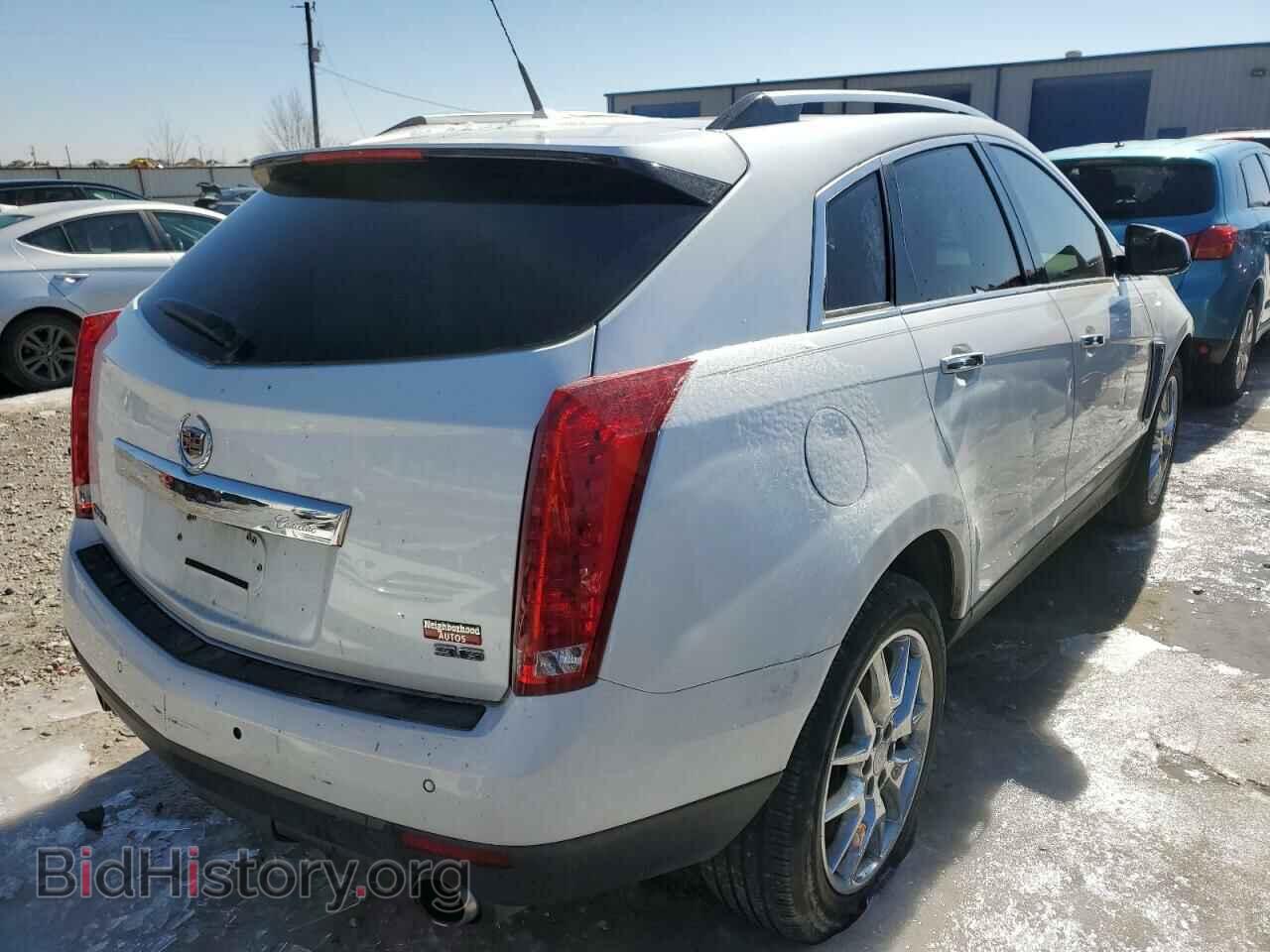 2014 CADILLAC SRX - VIN: 3GYFNDE30ES677985 - Фото 3