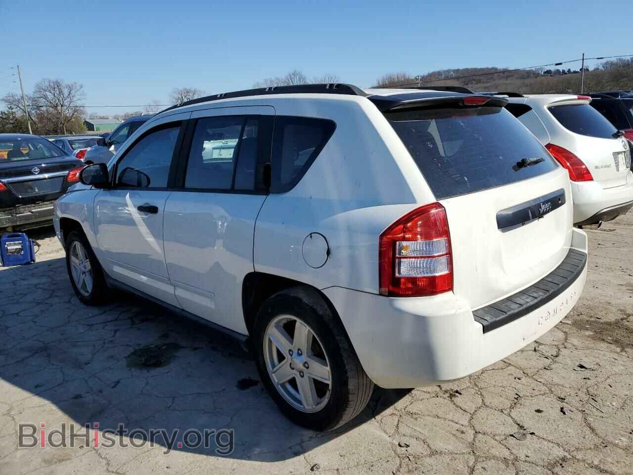 2010 JEEP COMPASS - VIN: 1J4NT4FB3AD504186 - Photo 2