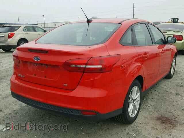 2015 Ford FOCUS (VIN 1FADP3F20FL319662) — photo 4 of 10