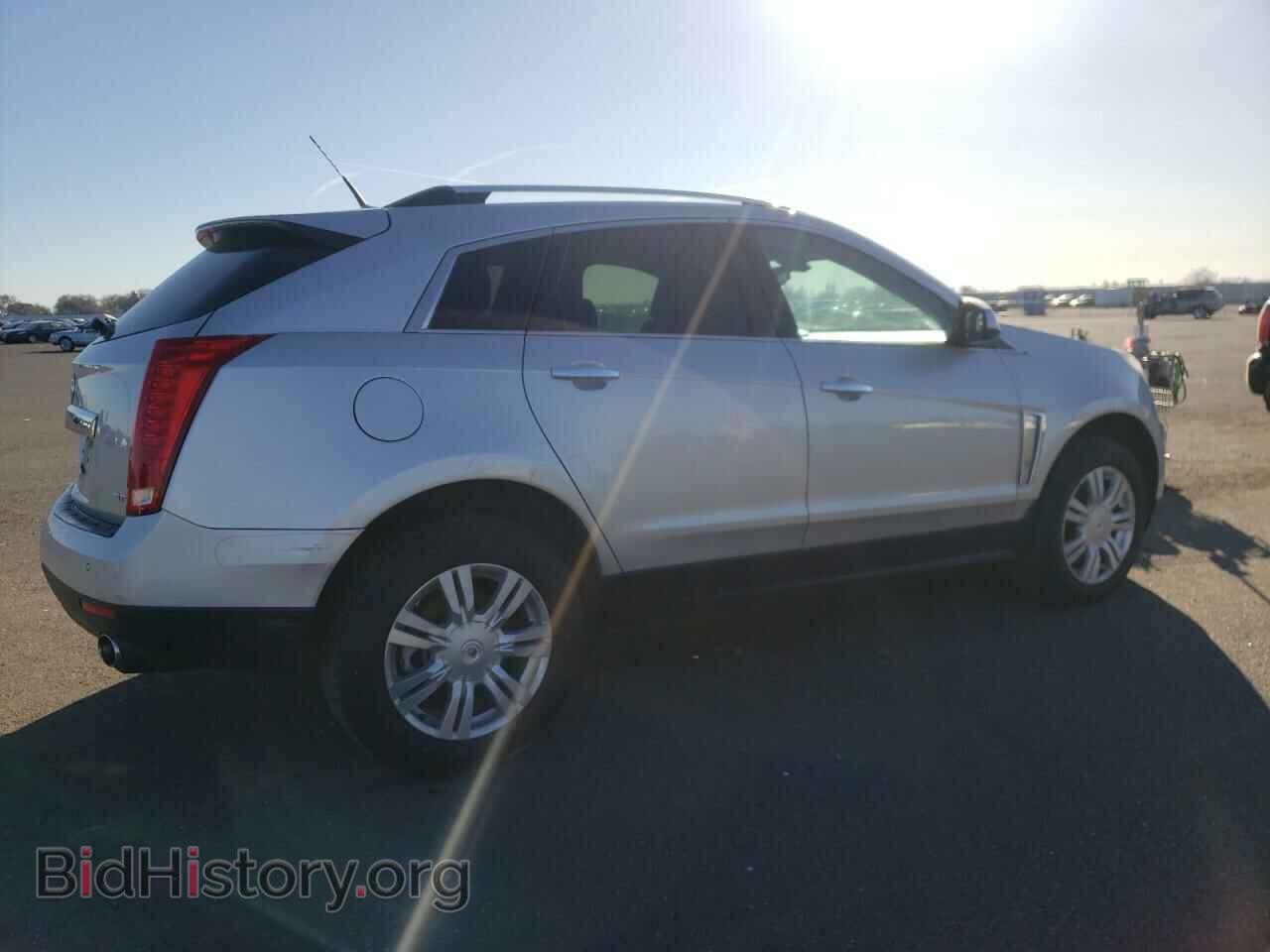 2014 CADILLAC SRX - VIN: 3GYFNBE37ES603340 - Фото 3
