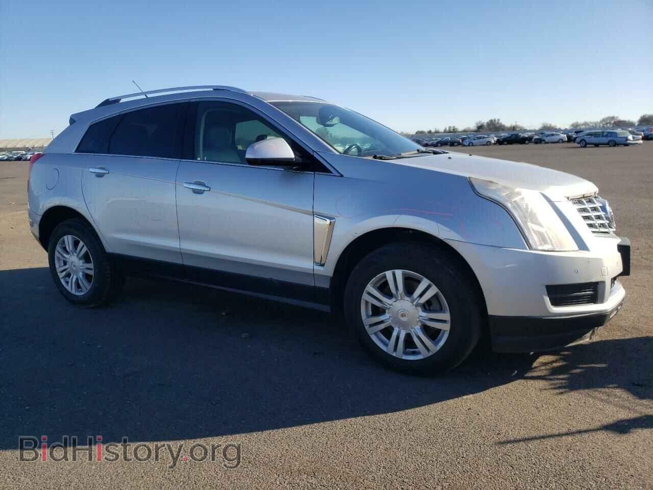 2014 CADILLAC SRX - VIN: 3GYFNBE37ES603340 - Фото 4