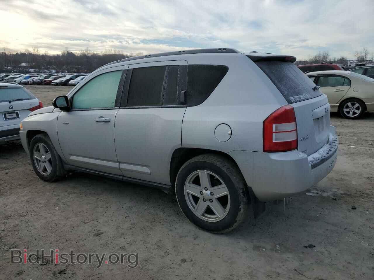 2010 JEEP COMPASS - VIN: 1J4NF1FB7AD619945 - Photo 2